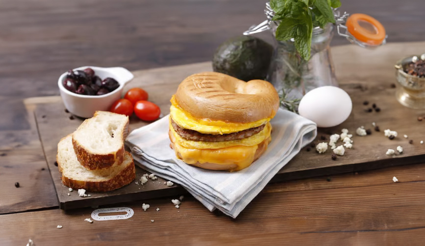 A delicious breakfast sandwich creation from Two Sons, perfect for starting your day.